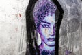 Street art wall of woman portret. Textured artwork on wall. City graffiti concept.