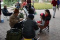 A street artist draws a portrait of a little girl