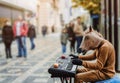 A street artist with a masked horse`s head plays the piano.