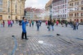 Street artist in the old town of Dresden entertains tourists