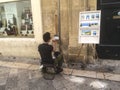 Street artist, paints picture in the streets of Lecce Puglia-Italy