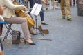 Street artist plays the cello in the streets of Rome