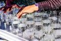 Street artist plays full glasses of water