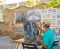 Street artist in Rhodes Royalty Free Stock Photo