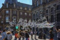 Street artists on Dam Square in Amsterdam. Royalty Free Stock Photo