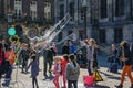 Street artists on Dam Square in Amsterdam. Royalty Free Stock Photo