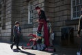 Street artists performing in a street of Edinburgh during the Fringe Festival in Scotland, United Kingdom