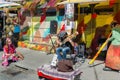 Street artists play on instruments at Farmer's Market