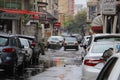 Street in Astara full of cars on a rainy day
