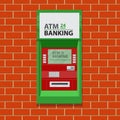 Street ATM teller machine on brick wall.