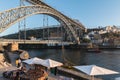 Street atmosphere near the Dom Luiz bridge in Porto, Portugal Royalty Free Stock Photo