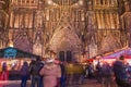 Street atmosphere at night on Notre Dame Cathedral Square where Christmas markets were installed - Strasbourg Royalty Free Stock Photo