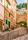 Spain Majorca, street with rustic stone houses in mediterranean village Royalty Free Stock Photo