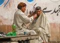 Street barber/hairdresser shop in Karachi, Pakistan.