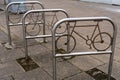 Street bicycle rack with cycle design. Urban sustainability in transport concept