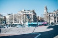 Street biker with a bike practicing free style and jumping at t