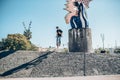 Street biker with a bike practicing free style and jumping at t Royalty Free Stock Photo