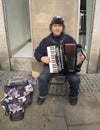 Street Busker Playing An Accordion In Sheffield City Centre.