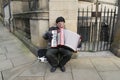 Street Busker Playing An Accordion In Sheffield City Centre.