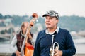 Street Buskers performing jazz songs on the Charles Bridge in Prague