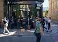 Street buskers outside clothing store.