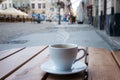 street cafe in Europe, cup of coffee on cozy cafe terrace Royalty Free Stock Photo