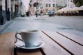 street cafe in Europe, cup of coffee on cozy cafe terrace Royalty Free Stock Photo