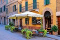 Street cafe in Montalcino town, Val d`Orcia, Tuscany, Italy.