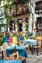 Street cafe in the narrow streets of the city. Royalty Free Stock Photo