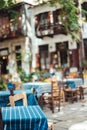 Street cafe in the narrow streets of the city. Royalty Free Stock Photo