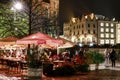 Street cafe by night in Krakow, Poland Royalty Free Stock Photo