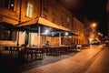 Street cafe on the old streets of the night city Royalty Free Stock Photo