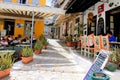 Street with cafe restaurants in Hydra island, Greece