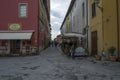 Street cafe and small shops in Montecarlo, Italy Royalty Free Stock Photo