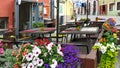 Street cafe table and chair with beautiful flowers in Old town of Tallinn Travel to Estonia tourism in Europa