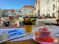 Street Cafe, tables and chairs in the city are waiting for people to rest and have a cup of coffee in Europe. Baltic Old Town of Royalty Free Stock Photo