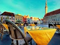 street cafe Tallinn , Estonia Glass of red wine on table top in old town hall square street cafe sunny day blue sky in city Royalty Free Stock Photo