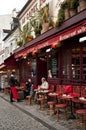 A street and cafes in Montmartre. Royalty Free Stock Photo