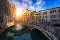 Street canal in Venice, Italy. Narrow canal among old colorful brick houses in Venice, Italy. Venice postcard Royalty Free Stock Photo
