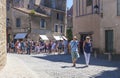 A street in Carcassone Old Town with small touristic shops and cafe