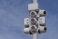 Street CCTV cameras against the blue sky