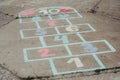 Street children`s games in classics on asphalt