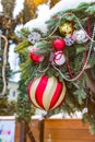 Street Christmas decoration. Christmas tree decorated with balls and garlands. Christmas celebration concept, holiday mood Royalty Free Stock Photo