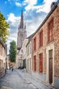 Street and the Church of Our Lady in Bruges, Royalty Free Stock Photo