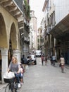 Street of the city centre with bicyles and pedestrians in Trevis