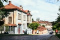 Street of the city of Lviv with old houses. Stone road in the old town. Urban retro landscape Royalty Free Stock Photo