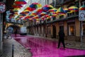 Street cleaners on Calle Rosa , the pink street in early morning. Lisbon, Portugal Royalty Free Stock Photo