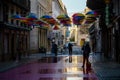 Street cleaners on Calle Rosa , the pink street in early morning. Royalty Free Stock Photo