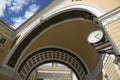 Street clock and the arch of the General Staff building in St. Petersburg