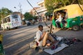 Street cobbler in India